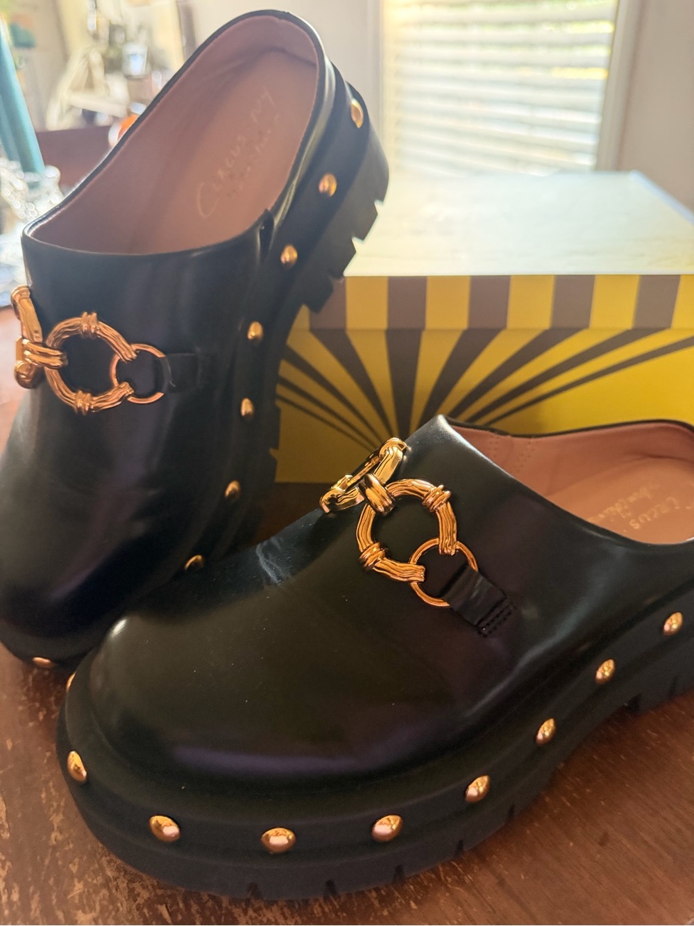 Circus NY by Sam Edelman Black Leather Slip-On Clogs with Gold Chain Accent